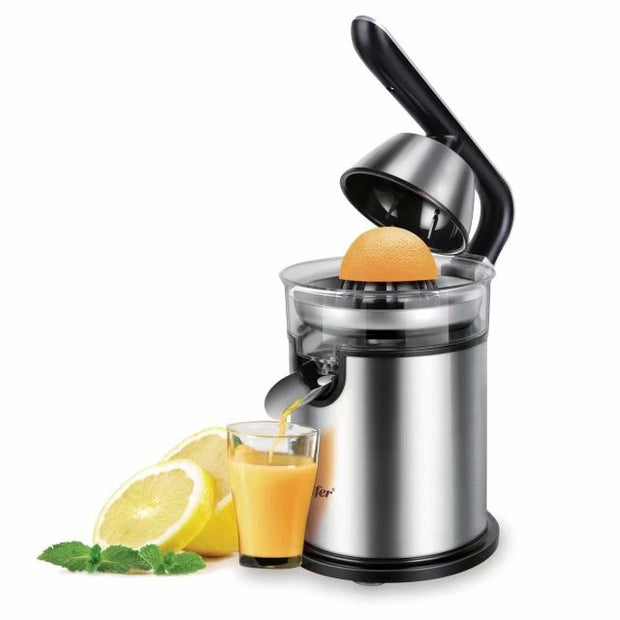 Electric Lemon Juicer Original Manual with stainless steel body and lever arm, juicing fresh orange into glass. Ideal for home citrus juicing.