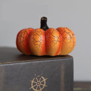 Small Halloween Pumpkin LED Lantern with cracked surface detail, perfect for tabletop decorations and autumn-themed arrangements.