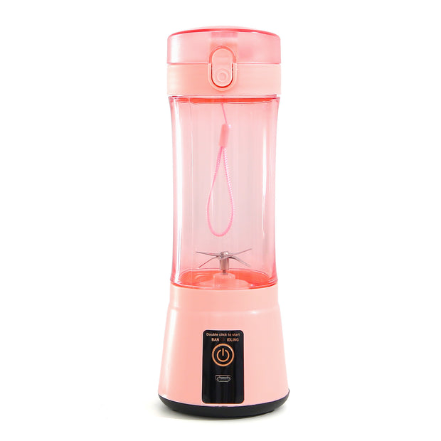 Pink USB rechargeable mini blender with safety lock and blending blades, designed for portable smoothie making.