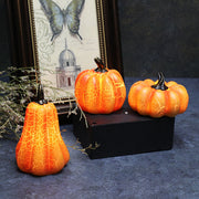 Realistic Halloween Pumpkin LED Lanterns arranged with vintage decor, perfect for autumn-themed home accents and spooky party lighting.