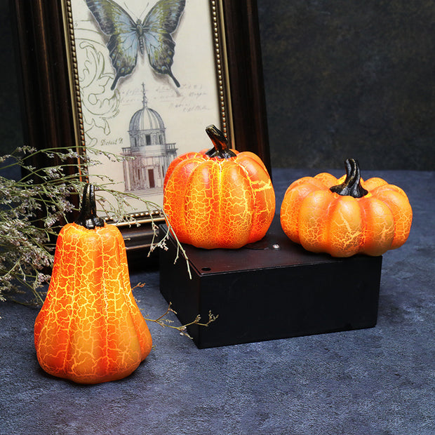 Realistic Halloween Pumpkin LED Lanterns arranged with vintage decor, perfect for autumn-themed home accents and spooky party lighting.