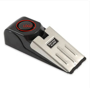 “Battery-powered door stop alarm for burglar detection

