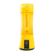 Yellow portable USB juicer blender with visible blending blades and safety strap, perfect for travel and kitchen use.