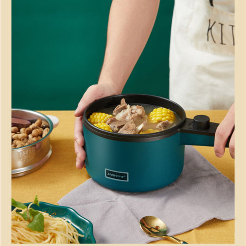 Mini Kitchen Multi-Function Electric Pot cooking corn and meat soup, featuring heat-insulating handle for safe home use.