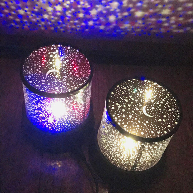 LED Star Night Light Projectors with crescent moon and star cutouts. Emits soft, colorful light perfect for kids’ bedtime routines.