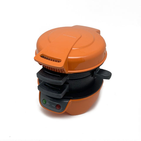 Orange breakfast machine with dual-layer design for cooking sandwiches and eggs, featuring power and ready indicator lights.