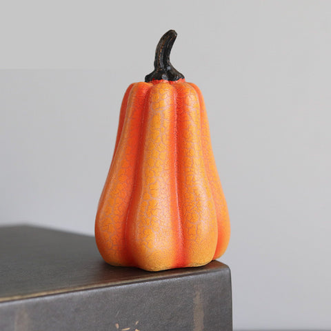 Tall gourd-shaped Halloween Pumpkin LED Lantern with realistic orange finish, ideal for seasonal shelf or mantel decor.